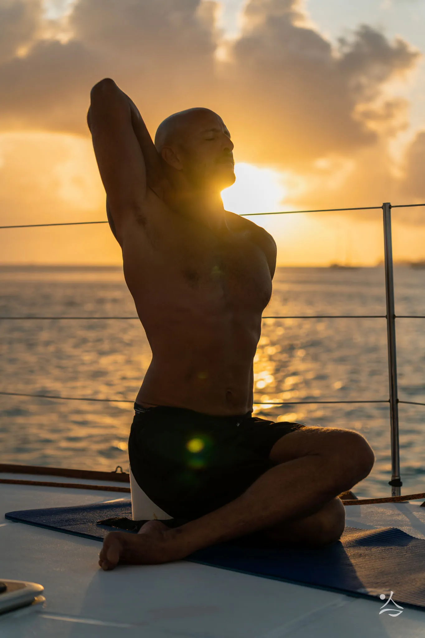 Yoga on deck at sunset